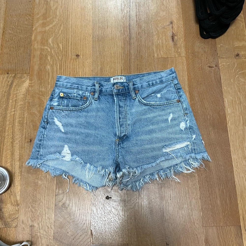 Agolde Blue Jean Shorts with Frayed Hem and Distressed Look